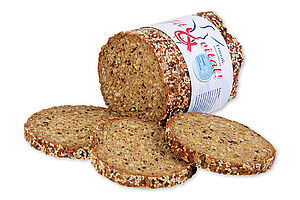 Pre-baked Protein Evening Bread canned with a crispy crust sprinkled with seeds.