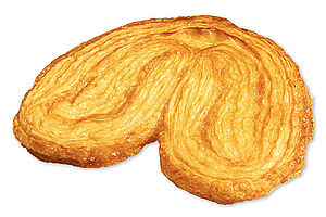Fully baked Palmier made of puff pastry.